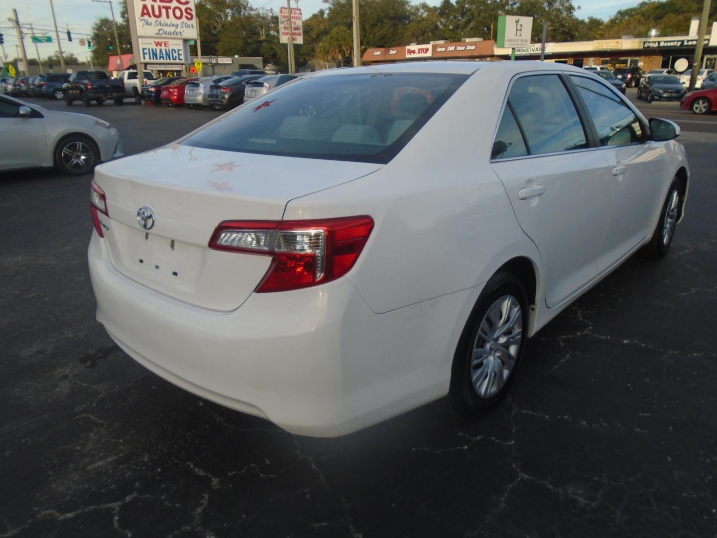 2014 Toyota Camry (4T1BF1FK0EU) , located at 6112 N Florida Avenue, Tampa, FL, 33604, (888) 521-5131, 27.954929, -82.459534 - Photo#3